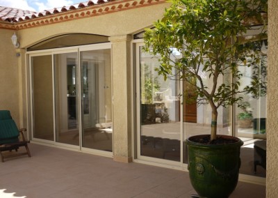 Fermeture pergola cintrée en aluminium